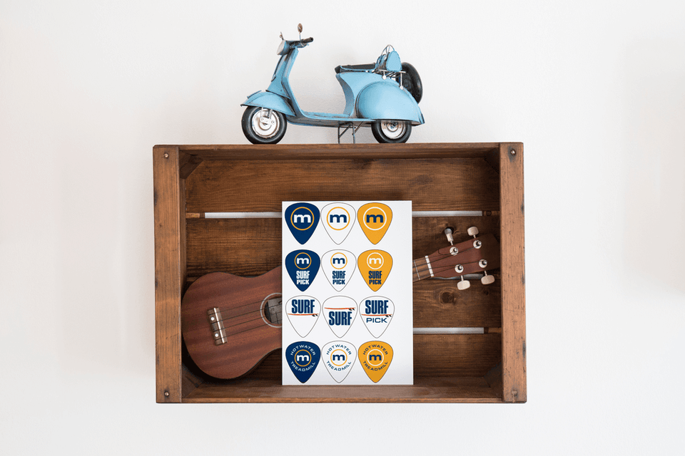 A display showing our guitar pick stickers.